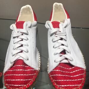 Andrew Stevens red and white raffia toe sneaker